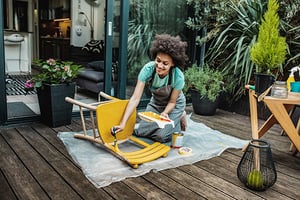 woman-painting-chair_iStock-1255615584_copyright-blackCAT_600x400px